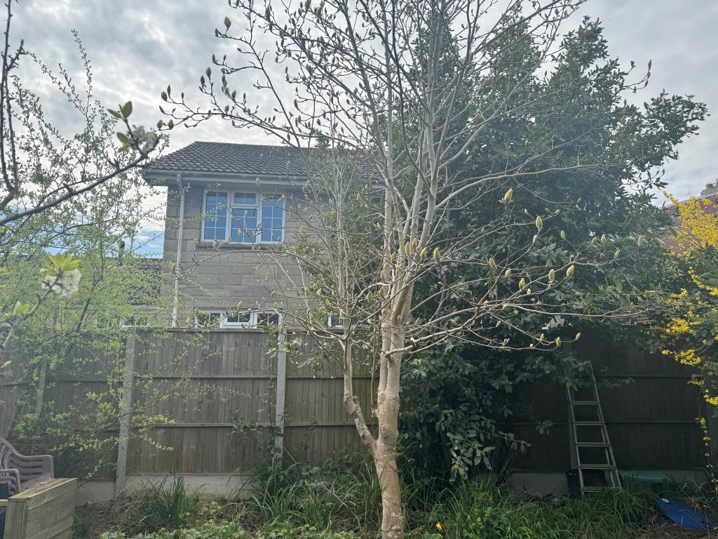Lot: 129 - TWO-BEDROOM FLAT WITH GARAGE AND GARDEN - The Rear of the Building from the Garden